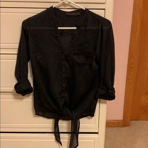 Black buttoned blouse with tie in front